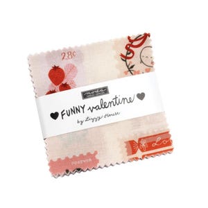 May include: A stack of fabric squares with a Valentine's Day theme. The fabric features red and pink illustrations of strawberries, stamps, and other Valentine's Day imagery. The words "FUNNY valentine" are printed on a white band.
