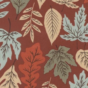 May include: A fabric pattern featuring a dense arrangement of various leaf shapes in shades of light blue, sage green, and cream, all set against a solid dark rust-colored background. The leaves display detailed vein structures throughout.