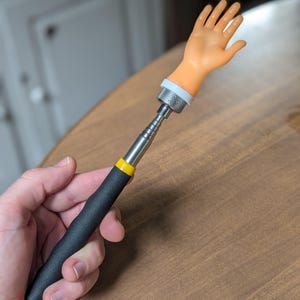 Tiny Hand on a Stick!