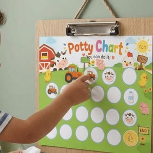 May include: A wooden clipboard holding a Potty Chart with farm-themed illustrations including a red barn, tractor, cow, pig, and chicken. The chart features a green field background, white circular spaces for stickers, and the text Potty Chart You can do it!