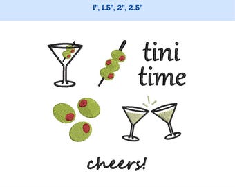 May include: An embroidered design with martini glasses, olives, and the phrases "tini time" and "cheers!" in black. The design is available in multiple sizes: 2.5 cm, 3.8 cm, 5 cm, and 6.4 cm.