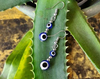 Dubbele boze oog-oorbellen, beschermingssieraden, spirituele boho-oorbellen, handgemaakt Peru