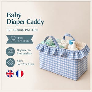 May include: A rectangular fabric diaper caddy featuring a blue and white gingham pattern with a ruffled trim along the top edge and two handles. The caddy contains internal dividers holding baby items. Text includes Baby Diaper Caddy PDF SEWING PATTERN.