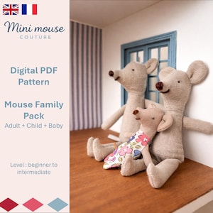 May include: Three beige fabric mouse dolls, an adult, a child, and a baby, are arranged on a wooden surface. The baby mouse wears a floral print garment. The image includes text: "Mini mouse couture, Digital PDF Pattern, Mouse Family Pack, Adult + Child + Baby."