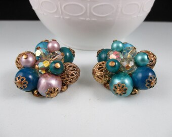 Gorgeous Pair of clip-on Earrings with Aurora Borealis Rhinestones, Faux Blue, Pink Pearls in Gold Tone Filigree Setting