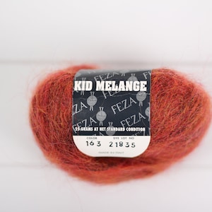1 ball Feza Kid Melange, color 163, discontinued mohair yarn. Rust colored Italian lace yarn for fibre art, knitting, crochet and weaving.