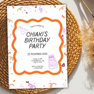 May include: A white birthday party invitation with orange and purple accents. The invitation reads "Chiaki's Birthday Party" with the date and time. A cake illustration and confetti complete the design. The invitation is on a woven background.