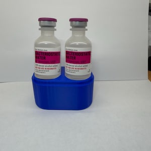 May include: A set of three ceramic mugs with a speckled, matte finish. The mugs are in shades of cream, light gray, and dark gray. Each mug has a simple, minimalist design, perfect for coffee or tea.