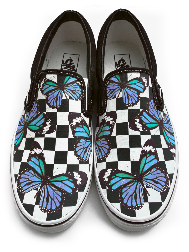 blue butterfly slip on vans