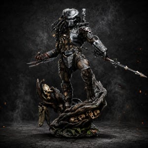 May include: A detailed Predator figurine featuring a metallic mask, dark armor, and long dreadlocks. The character holds a spear in one hand and bladed gauntlets on the other, standing atop a base decorated with multiple skulls and twisted roots.