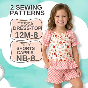 May include: A sewing pattern set featuring the Tessa dress-top in sizes 12M-8 and Tilly shorts-capris in sizes NB-8. The garment shown is a floral print top with pink gingham sleeves and a matching pink gingham ruffled hem and shorts set.