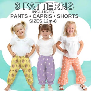 May include: A sewing pattern set for children's pants, capris, and shorts in sizes 12m-8. The image displays three variations: yellow patterned pants, purple capris with ruffled hems, and peach-colored pants with double-ruffled hems.