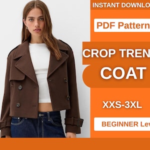 May include: A brown double-breasted crop trench coat with long sleeves, buttoned cuffs, and a wide collar. The text on the right side reads: INSTANT DOWNLOAD, PDF Pattern, CROP TRENCH COAT, XXS-3XL, BEGINNER Level. The coat is worn over a white top.