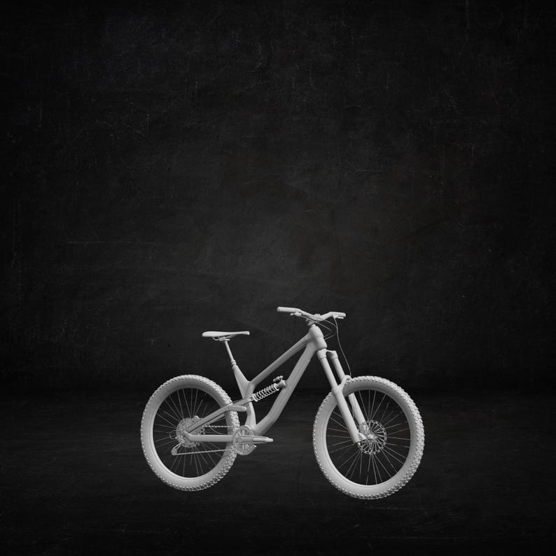 May include: A white mountain bike with a full suspension system, disc brakes, and knobbly tyres. The bicycle is set against a dark, textured background, highlighting its design and components.