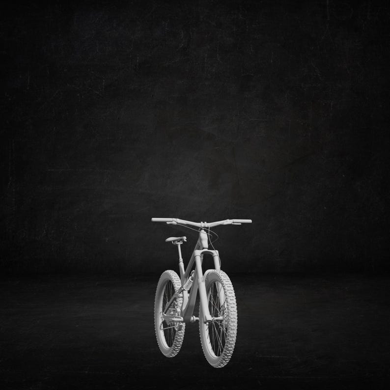 May include: A white mountain bike with chunky tyres and a suspension system. The bike has a curved handlebar and a seat. The image is set against a dark background.