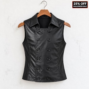 May include: A black sleeveless waistcoat made of a smooth material with a pointed collar and a double-breasted front closure featuring ten black buttons arranged in two vertical rows. The garment is displayed on a wooden hanger against a plain background.