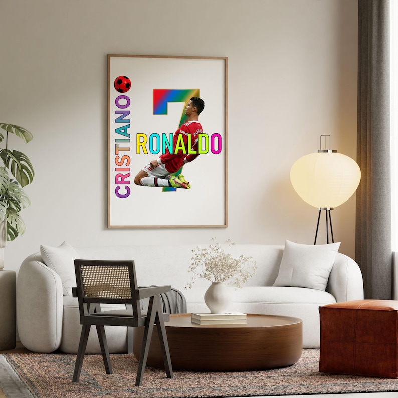 May include: A framed poster featuring Cristiano Ronaldo in a red jersey, with the number 7 in rainbow colors. The name "RONALDO" is in yellow, and "CRISTIANO" is in purple. A soccer ball graphic is also included.