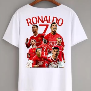 May include: White t-shirt featuring a collage of images of Cristiano Ronaldo in a red soccer uniform. The word "RONALDO" is printed in red above the images, with the number "7" in red below it.