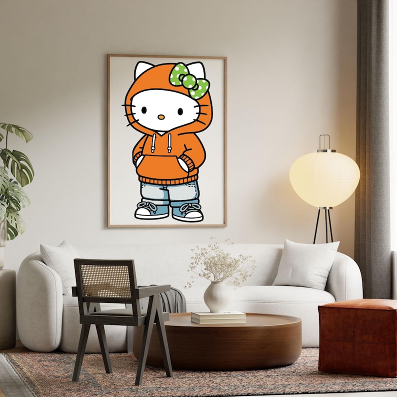 May include: A framed print featuring a cartoon character wearing an orange hoodie with a green polka dot bow, blue jeans, and sneakers. The character has a white face and black eyes. The print is displayed in a living room setting.