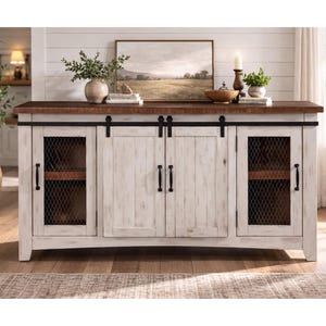 May include: A white and brown wooden sideboard with sliding doors and metal mesh accents. The cabinet has a dark brown top and black hardware. The design is rustic and farmhouse style.