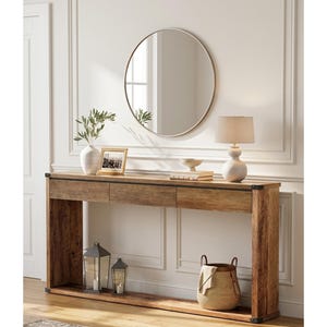May include: A wooden console table with three drawers, a lower shelf, and metal corner accents. A round mirror hangs above the table, which is decorated with a lamp, vase, framed photo, and decorative basket. The table is 60 inches long.
