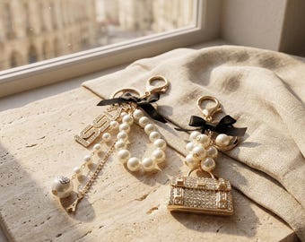 Pearl Bag Charm Keychain with Gold Bow and Rhinestones – Elegant Designer Style Accessory