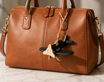 Porte-clés en cuir avec breloque pour sac avion, accessoire de sac à main de voyage fait main, pendentif avion, cadeau pilote, cadeau pour amoureux de l'aventure