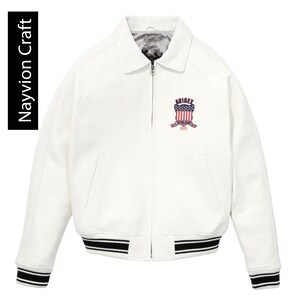 May include: A set of three ceramic mugs with a speckled, matte finish. The mugs are in shades of cream, light gray, and dark gray. Each mug has a simple, minimalist design, perfect for coffee or tea.