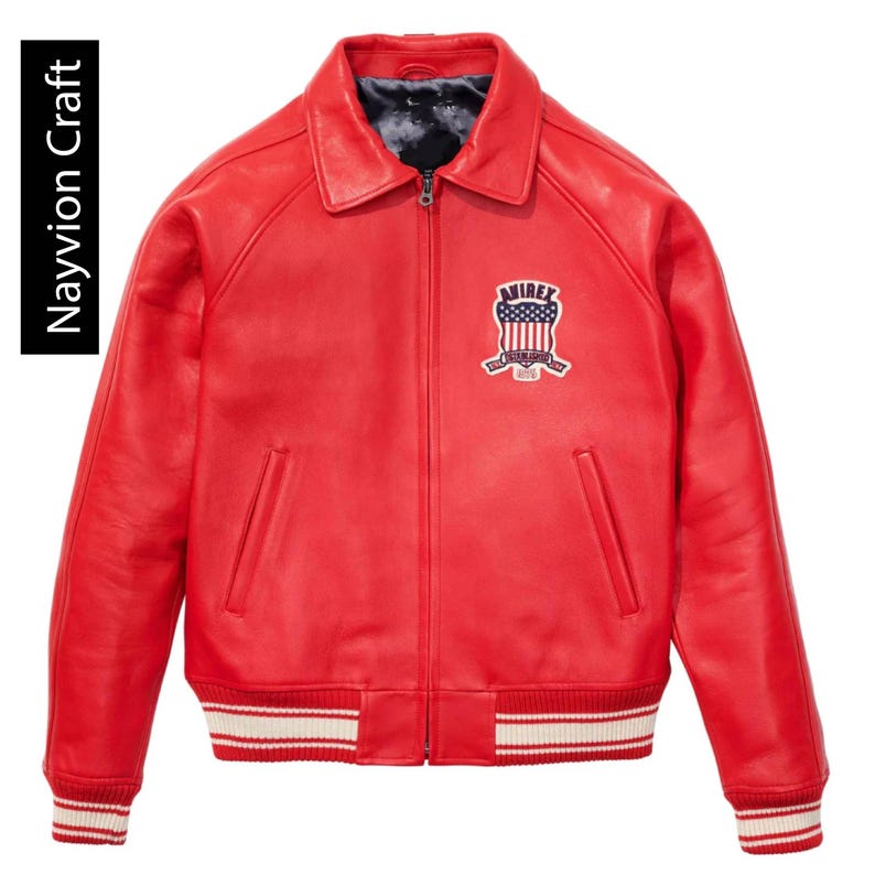 May include: A bright red leather jacket with a zip-up front, collar, and a patch on the chest. The jacket has white and red striped cuffs and hem. The text "Navyion Craft" is on the left side of the image.