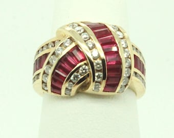 Ruby and diamond 14k gold ring. Finger size 7.25