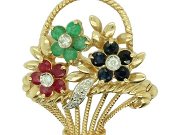 14K gold basket of flowers brooch with emeralds, rubies, sapphires and diamonds.