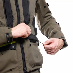 May include: A set of three ceramic mugs with a speckled, matte finish. Each mug features a different color: light blue, cream, and gray. The mugs have a simple, modern design and a comfortable handle.