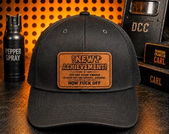 Dungeon Crawler Carl Trucker Hat – New Achievement Leatherette Patch Snapback