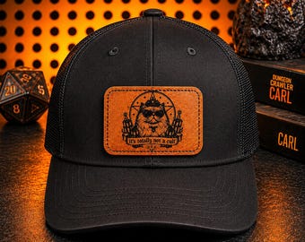 Dungeon Crawler Carl Hat, featuring Donut and “It’s totally not a cult, Mesh Truckers Hat (patch is available in our shop as well)