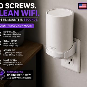 May include: A white Deco WiFi device plugged into a wall outlet. The device is cylindrical with a rounded top and is mounted on a white bracket. Text on the image reads "NO SCREWS. CLEAN WIFI. PLUGS IN. MOUNTS IN SECONDS." and "MADE IN USA."