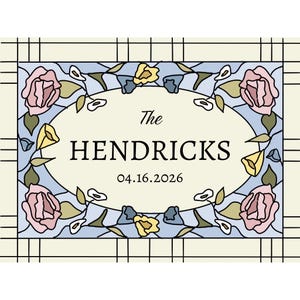 May include: A stained glass design with a light blue background, featuring pink roses, yellow flowers, and green leaves. The text "The HENDRICKS 04.16.2026" is centered within an oval frame. The design is framed with black lines.