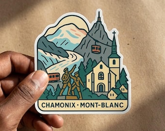 May include: A die-cut sticker featuring a stylized illustration of Chamonix-Mont-Blanc. The design includes a mountain range, a cable car, a church, a statue of two figures, and a train, with the text CHAMONIX-MONT-BLANC printed at the bottom.