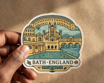 May include: A die-cut sticker featuring a stylized illustration of the Roman Baths in Bath, England. The design uses a palette of yellow, teal, and cream, depicting the historic architecture, water, and arched bridge. The text BATH ENGLAND is printed.