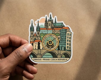 May include: A die-cut sticker featuring a stylized illustration of the Prague skyline, including the astronomical clock, Charles Bridge, and historic buildings in shades of teal, orange, and cream. The text reads PRAGUE-PRAHA-CZECH REPUBLIC.