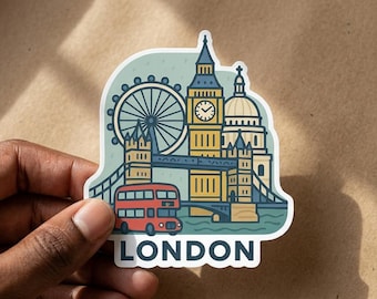 May include: A die-cut sticker featuring a colorful illustration of London landmarks including the London Eye, Big Ben, Tower Bridge, and St. Paul's Cathedral, with a red double-decker bus in the foreground and the word LONDON printed in bold letters.