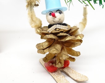 Antique Christmas Pine Cone Snowman on Skis, Vintage Pine Cone Body, Spun Cotton Head, Faux Feather Tree