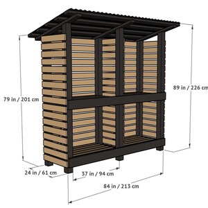 May include: A wooden firewood storage shed with a black frame and natural wood slats. It features a slanted corrugated roof, two storage levels, and measures 84 inches wide, 24 inches deep, 89 inches high at the peak, and 79 inches at the side.