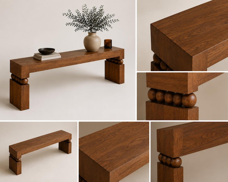 May include: A rectangular wooden bench featuring a thick, flat top surface and two sturdy legs. Each leg is connected to the bench top by a row of four spherical wooden balls. The wood has a visible grain pattern in a medium brown tone.