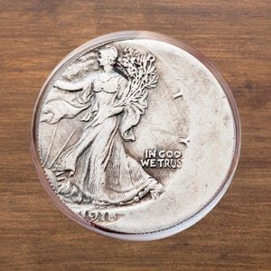 The 1918 Walking Liberty Half Dollar Double Struck Error Plated Coin - Circulated