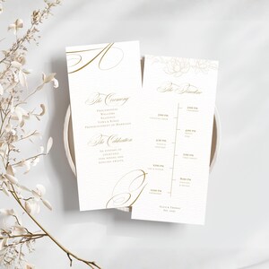 May include: Two ivory wedding programs with gold calligraphy. One details the ceremony, the other the timeline. The text includes "The Ceremony" and "The Celebration". The timeline lists times for cocktails, dinner, and the first dance. Floral accents are present.