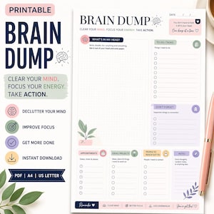May include: Printable Brain Dump planner with sections for tasks, notes, and appointments. The design includes text that reads "Clear Your Mind, Focus Your Energy, Take Action." A pink pen rests on the right side of the page.