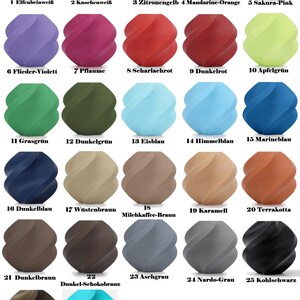 May include: A collection of 27 decorative, spiral-shaped objects in various colors, including white, yellow, orange, pink, purple, red, green, blue, brown, and gray. Each object has a unique color and is labeled with a number and color name.
