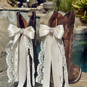 May include: A set of three ceramic mugs with a speckled, matte finish. The mugs are in shades of cream, light gray, and dark gray. Each mug has a simple, minimalist design and a rounded handle.