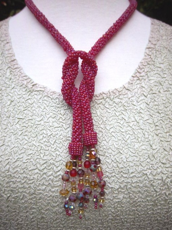 Items similar to Cranberry Rope Knotted Necklace with Beaded Fringe on Etsy