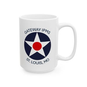 May include: White ceramic mug with a blue and red star design. The text "GATEWAY IPMS ST. LOUIS, MO" is printed on the mug.
